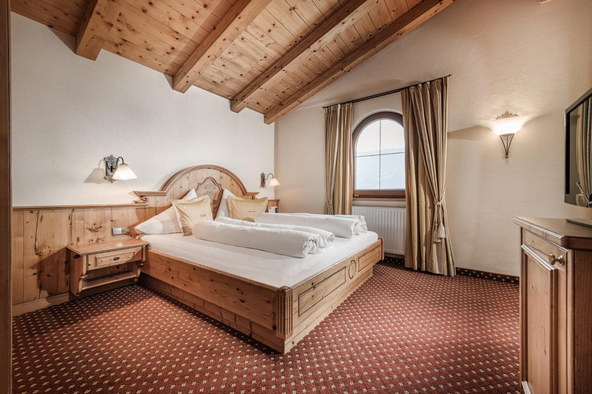 Aster Boutique Hotel & Chalets Fuegenberg Rom bilde